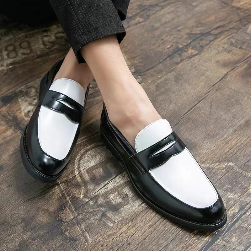 Black and white panelled British loafers