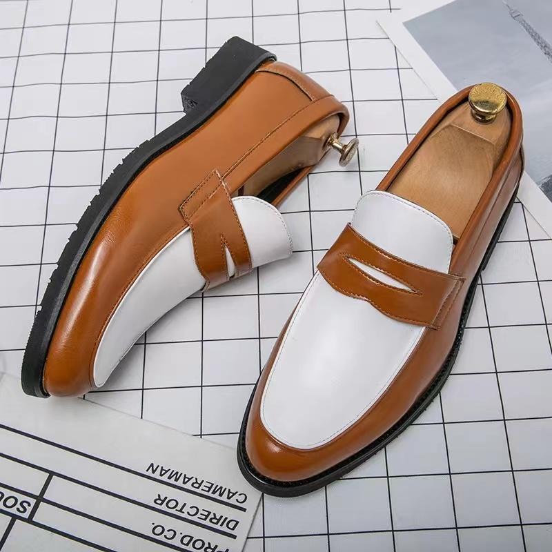 Black and white panelled British loafers