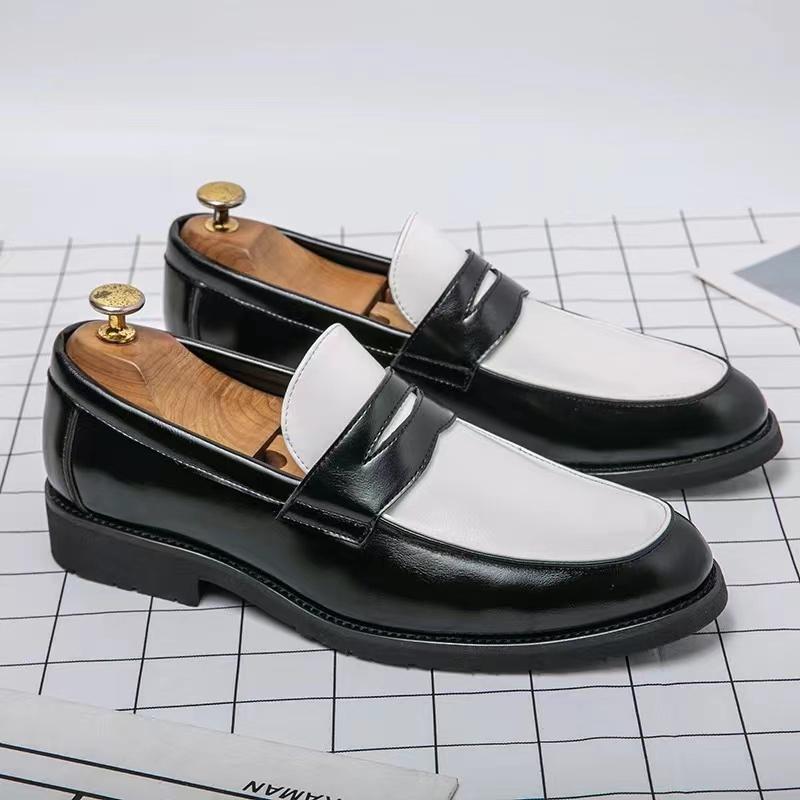 Black and white panelled British loafers