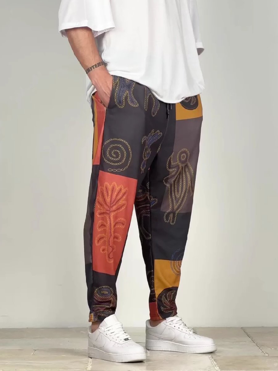 Loose-fitting, breathable panelled patterned trousers